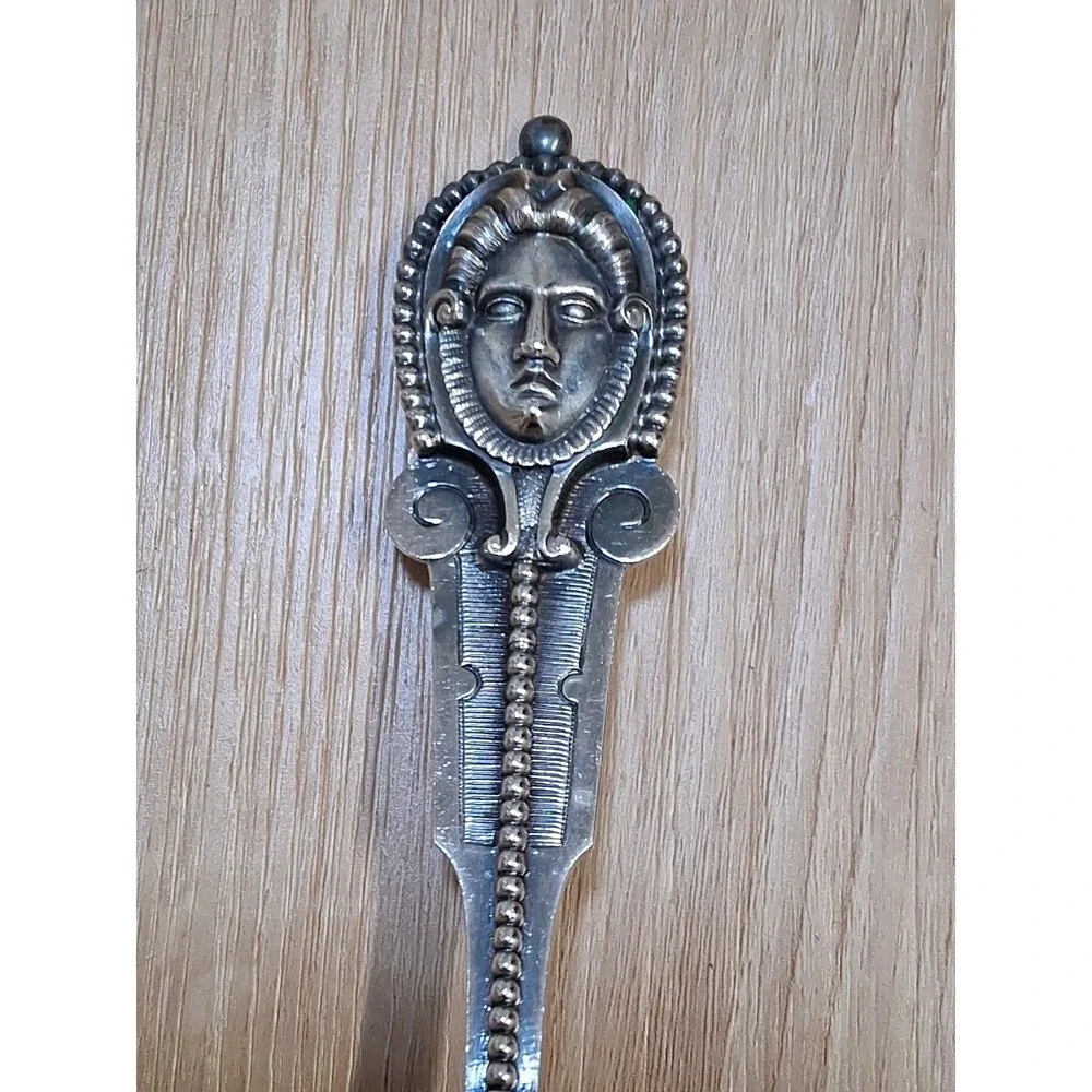 WOOD & HUGHES pierced Serving Ladle / Sifter MEDALLION 3D face. Rare 1870s